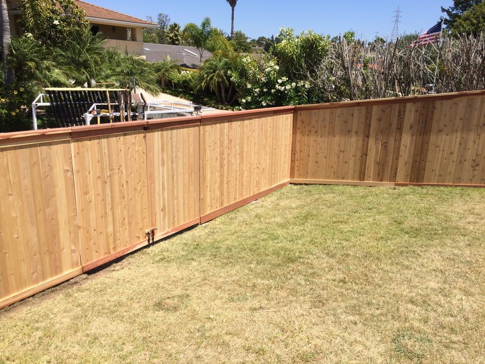 Horizontal cedar backyard fence built by HD Fence