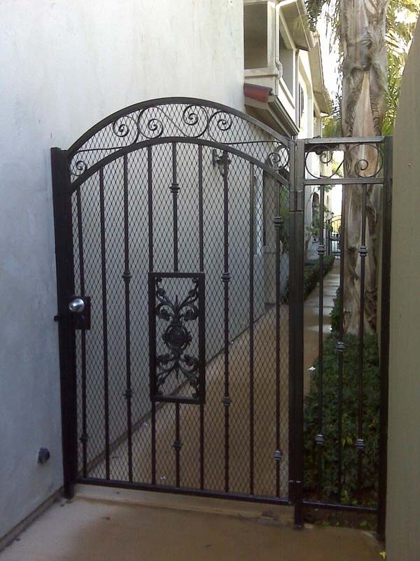 Decorative scrollwork iron pedestrian gate by HD Fence